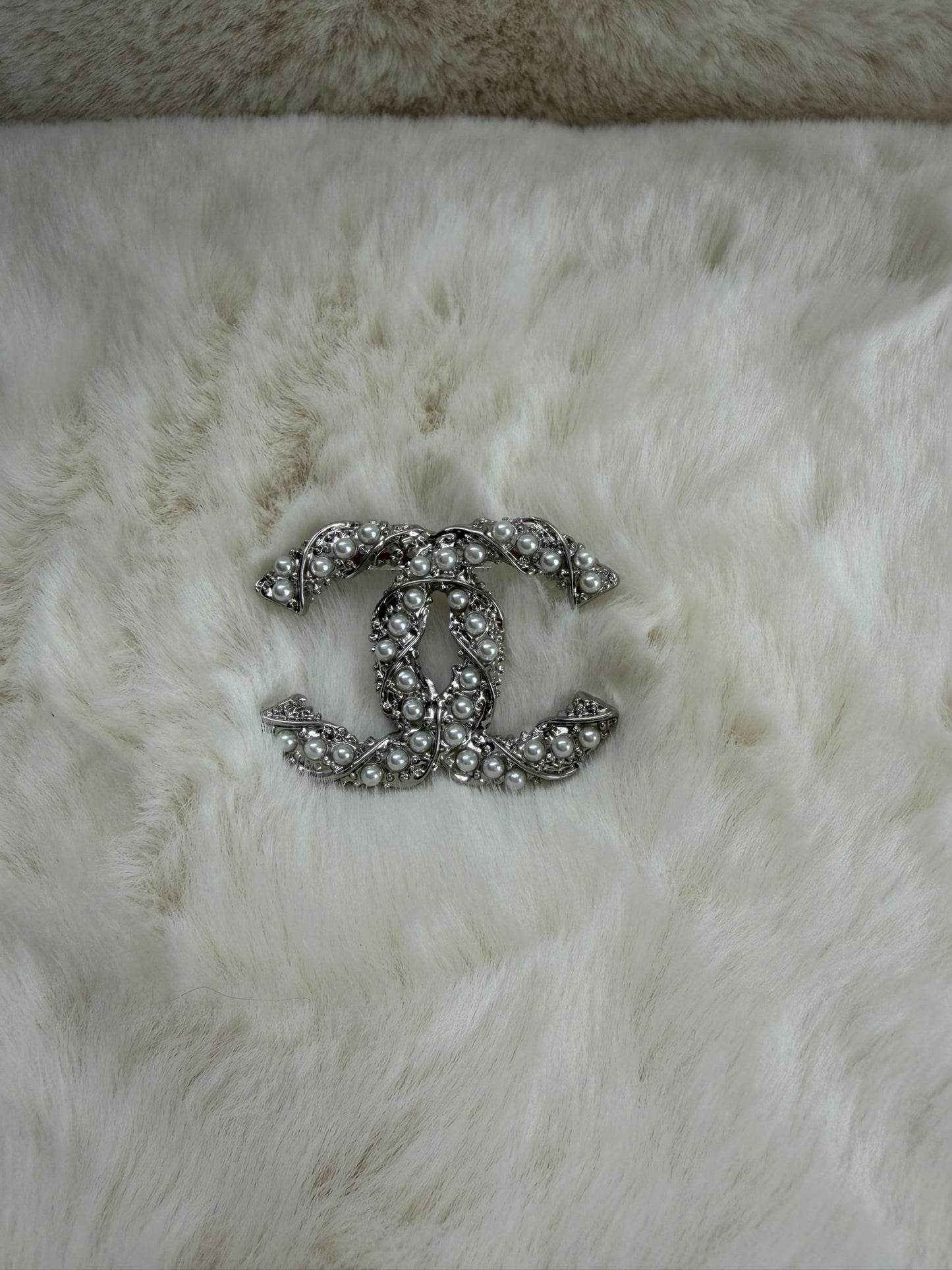 Silver broach
