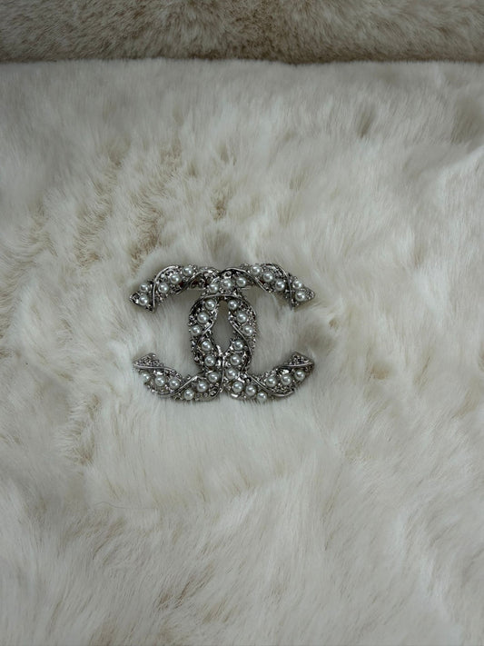 Silver broach